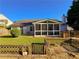 Well maintained backyard with a screened-in porch and manicured lawn at 2642 Colleen Ln, Dacula, GA 30019