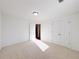 Bedroom with neutral carpeting and a closet, natural light coming from the window at 2642 Colleen Ln, Dacula, GA 30019