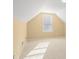 This bedroom features neutral paint, carpet, and an oversized window that brings in a lot of natural light at 2642 Colleen Ln, Dacula, GA 30019