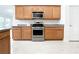 Well-equipped kitchen features stainless steel appliances and granite countertops at 2642 Colleen Ln, Dacula, GA 30019