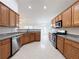 Spacious kitchen features stainless appliances and granite countertops at 2642 Colleen Ln, Dacula, GA 30019