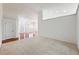 Inviting living room showcasing carpet flooring, an open layout, and natural light at 2642 Colleen Ln, Dacula, GA 30019