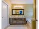 Double vanity bathroom featuring granite counters, updated fixtures, and a soaking tub at 4348 Tillage Path, Douglasville, GA 30135