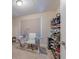 This home office features natural light and shelving at 4348 Tillage Path, Douglasville, GA 30135