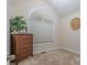 A secondary bedroom featuring carpeted floors and a large window at 4348 Tillage Path, Douglasville, GA 30135