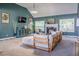Spacious living room with vaulted ceilings, fireplace, stylish decor, and abundant natural light from multiple windows at 4348 Tillage Path, Douglasville, GA 30135