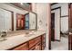 Bathroom features marble countertops, hardwood floors, and lots of storage at 5161 Hermitage Dr, Powder Springs, GA 30127