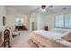 Guest bedroom with two beds, desk, and natural light from two windows at 5161 Hermitage Dr, Powder Springs, GA 30127