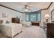 Inviting bedroom with two twin beds, bay window, and classic trim at 5161 Hermitage Dr, Powder Springs, GA 30127