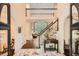 Elegant foyer with marble floors, staircase, and open view to the living area, creating a grand entrance at 5161 Hermitage Dr, Powder Springs, GA 30127