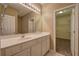 Bright bathroom with white cabinets and long mirror at 580 Camry Cir, Dallas, GA 30157