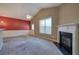 Comfortable living room with fireplace, and view to door with sidelight at 580 Camry Cir, Dallas, GA 30157