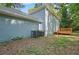 Exterior of home highlighting the back deck, lawn, and siding at 800 Post Road Cir, Stone Mountain, GA 30088