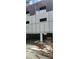 Exterior view of a home under construction with wood framing and open wall cavities, showcasing the building process at 1301 Lavista Ne Rd, Atlanta, GA 30324