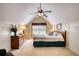 Comfortable bedroom featuring a bed with quilt, dresser and fan; perfect for relaxation at 2165 Robin Hood Trl, Cumming, GA 30040