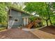 Charming two-story home featuring a screened porch and meticulously landscaped backyard at 2165 Robin Hood Trl, Cumming, GA 30040