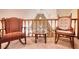 Cozy loft featuring rocking chairs and a small table, perfect for a reading nook at 2165 Robin Hood Trl, Cumming, GA 30040