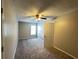 Bedroom with carpet, neutral walls and a window, providing a calm space at 3292 Shady Valley Ct, Loganville, GA 30052