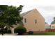 View of home siding with a glimpse of the back and a few windows on the upper story at 3292 Shady Valley Ct, Loganville, GA 30052