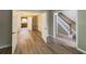 Open-concept living area showcasing new floors, fresh paint, and doorway to adjacent kitchen at 3292 Shady Valley Ct, Loganville, GA 30052