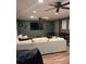 Spacious basement with a large seating area, TV, and a bar, ideal for entertaining at 40 Legend Creek, Douglasville, GA 30134