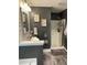 Stylish bathroom featuring a modern vanity, framed mirror, and walk-in shower at 40 Legend Creek, Douglasville, GA 30134