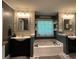 Charming bathroom with dual sinks, soaking tub, and modern fixtures at 40 Legend Creek, Douglasville, GA 30134