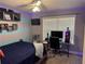 Cozy bedroom with desk, TV, and unique decor at 40 Legend Creek, Douglasville, GA 30134