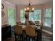 Cozy dining area bathed in natural light, featuring a rustic table set for an inviting meal at 40 Legend Creek, Douglasville, GA 30134
