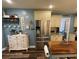 Well-lit kitchen with stainless steel appliances, light-colored cabinetry, and a butcher block island at 40 Legend Creek, Douglasville, GA 30134