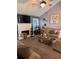 Cozy living room with fireplace, mounted TV, vaulted ceilings, and inviting seating area at 40 Legend Creek, Douglasville, GA 30134