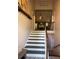 Inviting stairway with two-story ceilings and lots of natural light at 40 Legend Creek, Douglasville, GA 30134