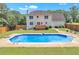 Enjoy this large in-ground pool, perfect for relaxation and entertainment in a private backyard at 161 Honey Creek Rd, Mcdonough, GA 30252