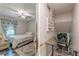 A bedroom and hallway/stairwell are viewed in this shot at 2642 Bridgehampton Sw Rd, Marietta, GA 30064