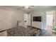 Calming bedroom features wood-look floors, natural light, and neutral paint with ensuite access at 2642 Bridgehampton Sw Rd, Marietta, GA 30064