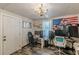 Bedroom with an American flag, desk, gaming chairs, and multiple computer screens at 2642 Bridgehampton Sw Rd, Marietta, GA 30064