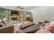 Spacious living room with hardwood floors, stone fireplace and comfortable seating area at 2642 Bridgehampton Sw Rd, Marietta, GA 30064