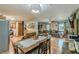 Open concept layout of the kitchen, dining area, and living space with hardwood floors at 2642 Bridgehampton Sw Rd, Marietta, GA 30064