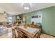 Open floor plan featuring living, dining and kitchen spaces with hardwood floors throughout at 2642 Bridgehampton Sw Rd, Marietta, GA 30064
