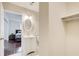 Bright bathroom featuring a modern white vanity and oval mirror, with a bedroom view at 2742 Alpine Rd, Atlanta, GA 30305