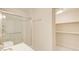 Bathroom features a glass enclosed shower and a large closet with built in shelving at 2742 Alpine Rd, Atlanta, GA 30305