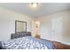 Bedroom with hardwood floors, comfortable bed, and ample closet space at 2742 Alpine Rd, Atlanta, GA 30305