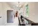 Galley kitchen featuring tile floors, stainless steel appliances, and pendant lighting at 2742 Alpine Rd, Atlanta, GA 30305