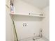 Dedicated laundry room with white shelf and tiled floor at 2742 Alpine Rd, Atlanta, GA 30305