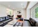 Living room with fireplace and stylish furniture; hardwood floors and neutral walls at 2742 Alpine Rd, Atlanta, GA 30305