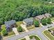 Aerial shot of homes in a suburban cul-de-sac nestled in a treed area at 271 Learwood Ln, Atlanta, GA 30349