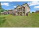 Backyard view shows the deck and stair access to the basement level at 271 Learwood Ln, Atlanta, GA 30349