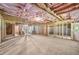 Unfinished basement with exposed beams and pink insulation at 271 Learwood Ln, Atlanta, GA 30349