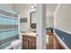 Spacious bathroom with a shower and a traditional-style single vanity at 271 Learwood Ln, Atlanta, GA 30349