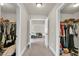 Bedroom entrance featuring a view of bedroom with two walk-in closets at 271 Learwood Ln, Atlanta, GA 30349